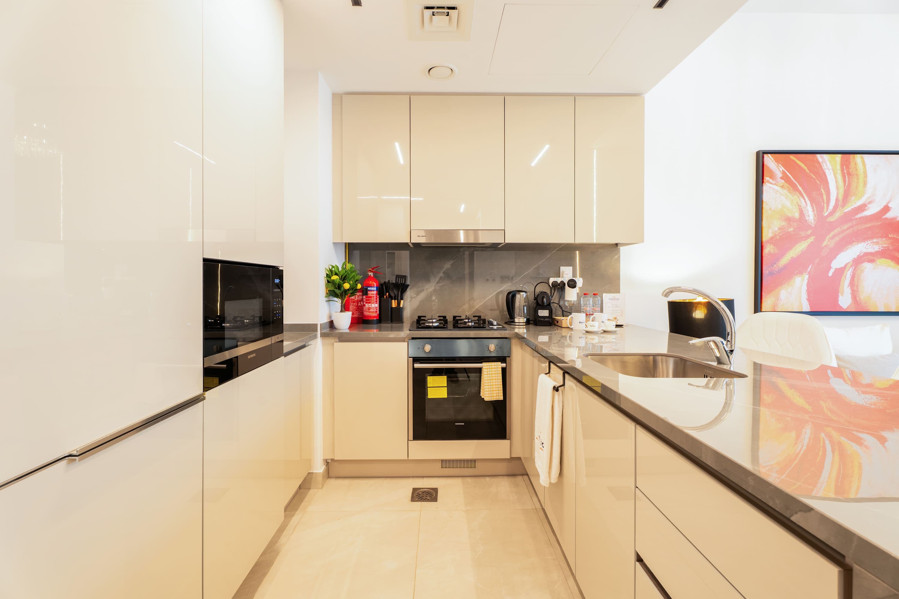 Rentico | Burj View 1BR Apt | Balcony & Foosball — photo 12