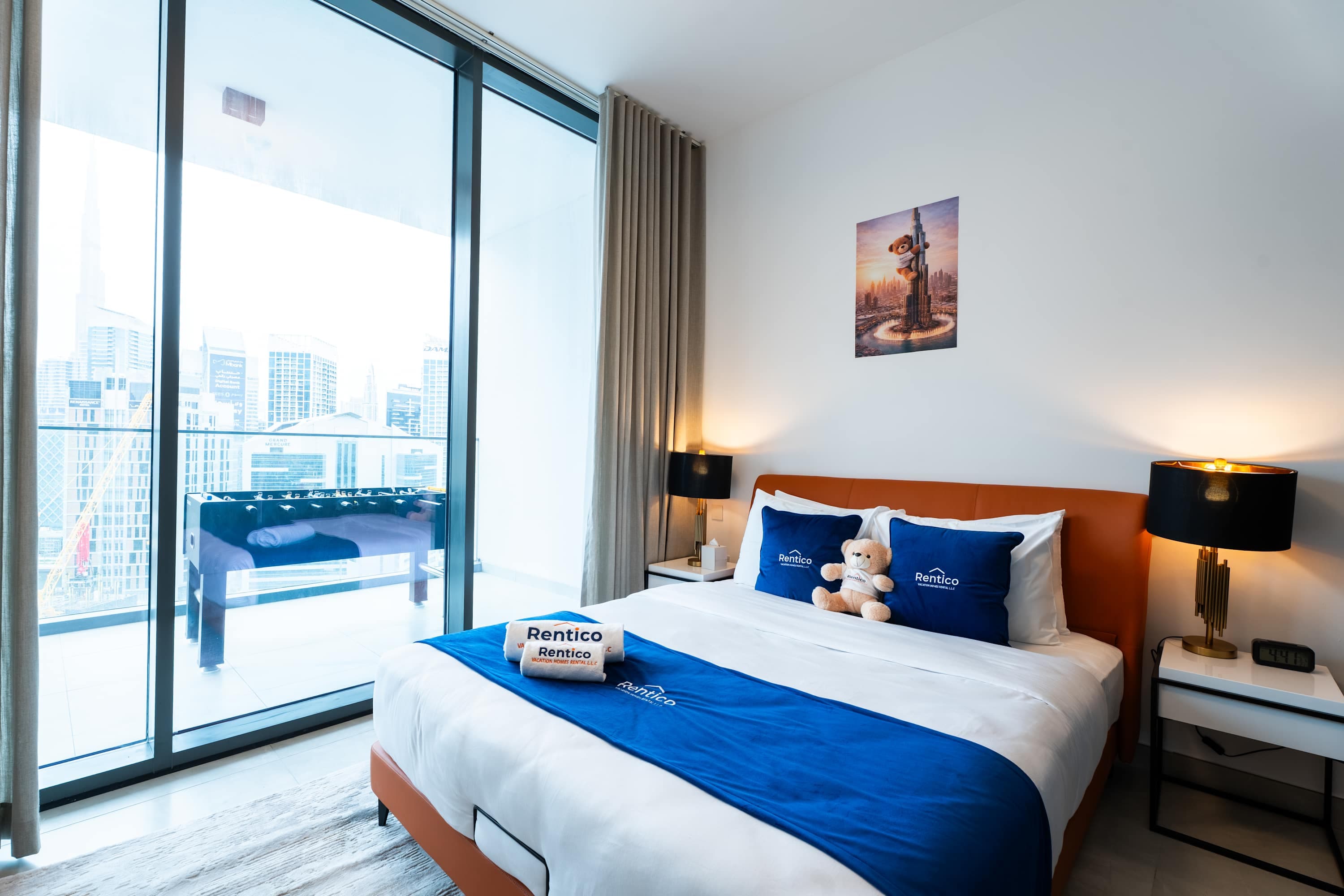 Rentico | Burj View 1BR Apt | Balcony & Foosball — photo 3