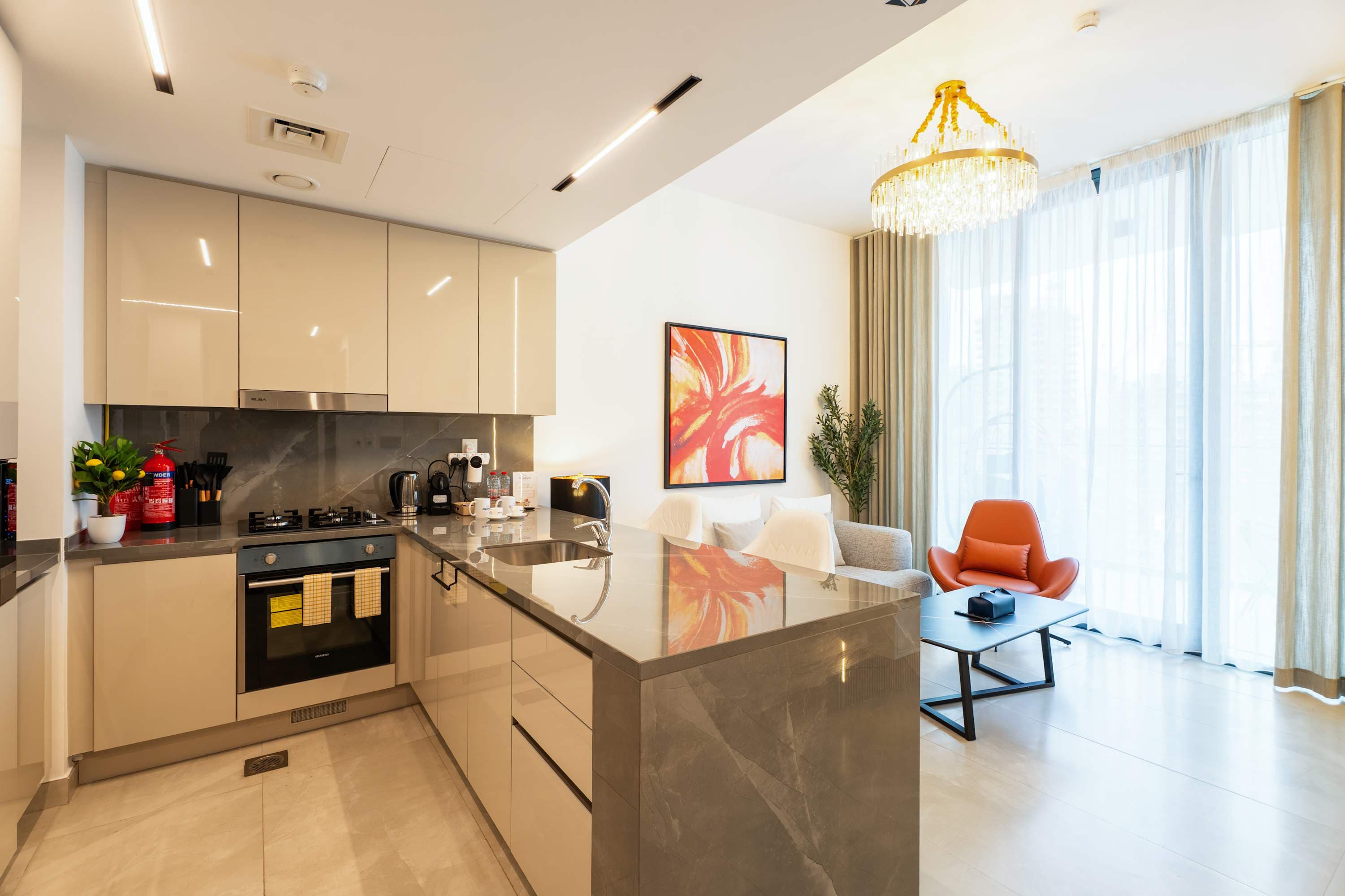 Rentico | Burj View 1BR Apt | Balcony & Foosball — photo 4
